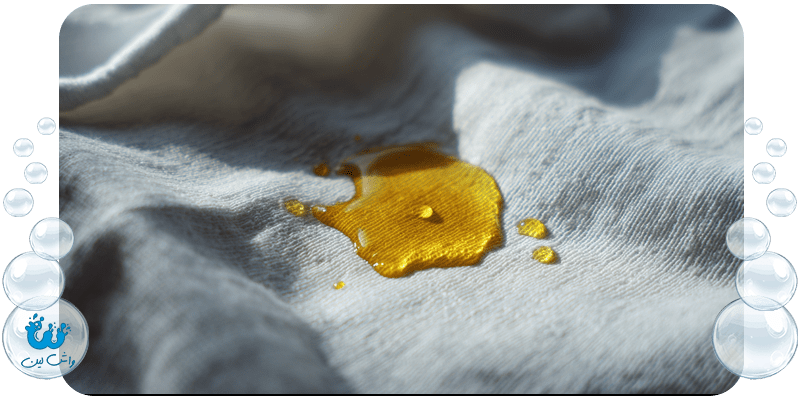 از بین بردن لکه چربی روی لباس