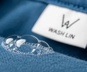 اصول شستشوی لباس راهنمای کامل نمادها و تفکیک رنگ‌ها