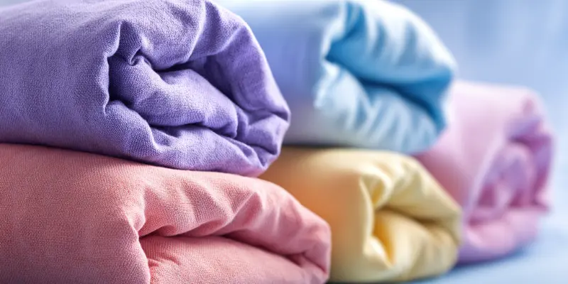 شستشوی روتختی پشم شیشه و پنبه‌دوزی: بدون گوله شدن الیاف